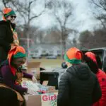 Holiday volunteers preparing to hand out donations to families