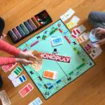 family playing monopoly