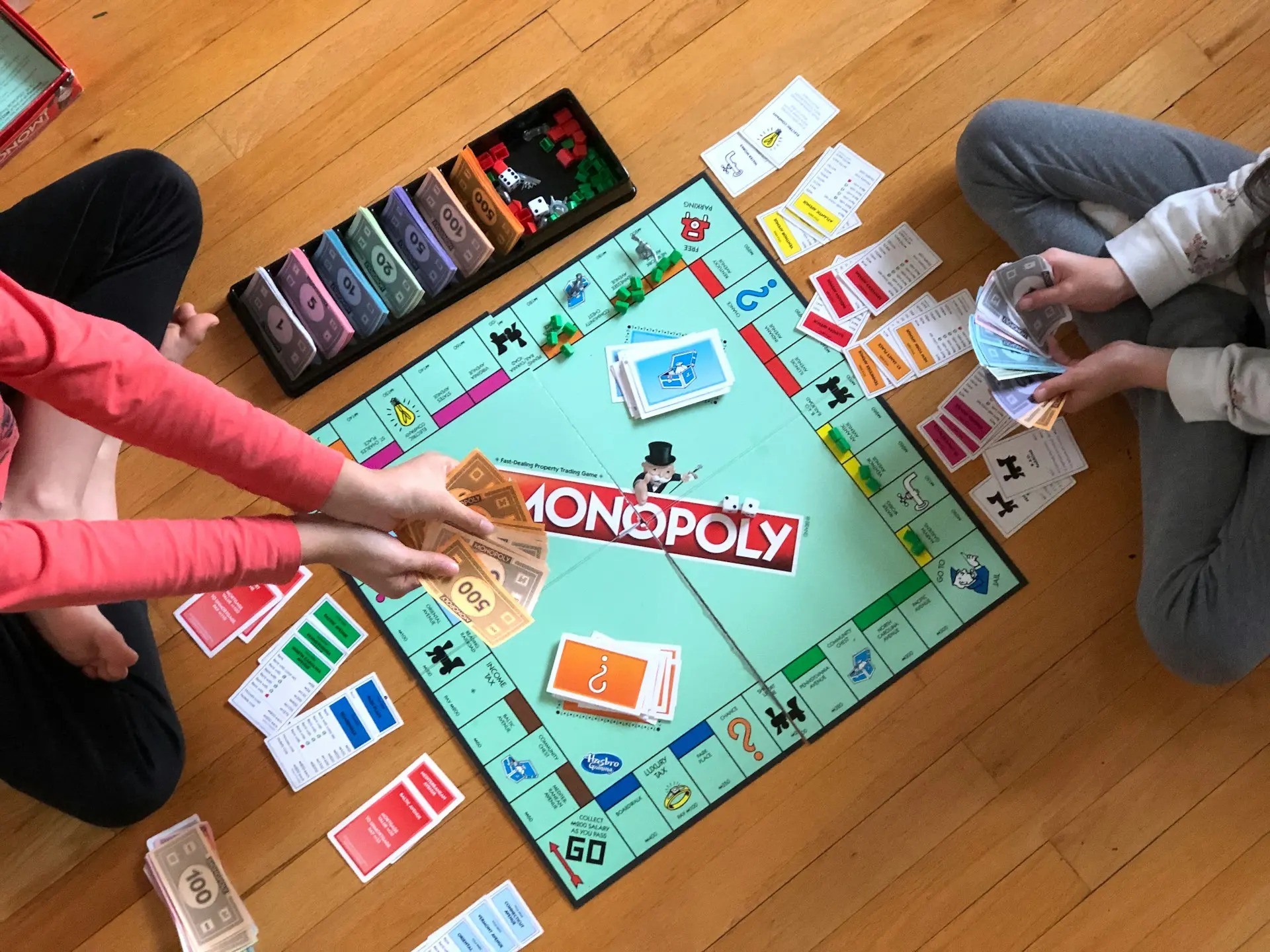 family playing monopoly
