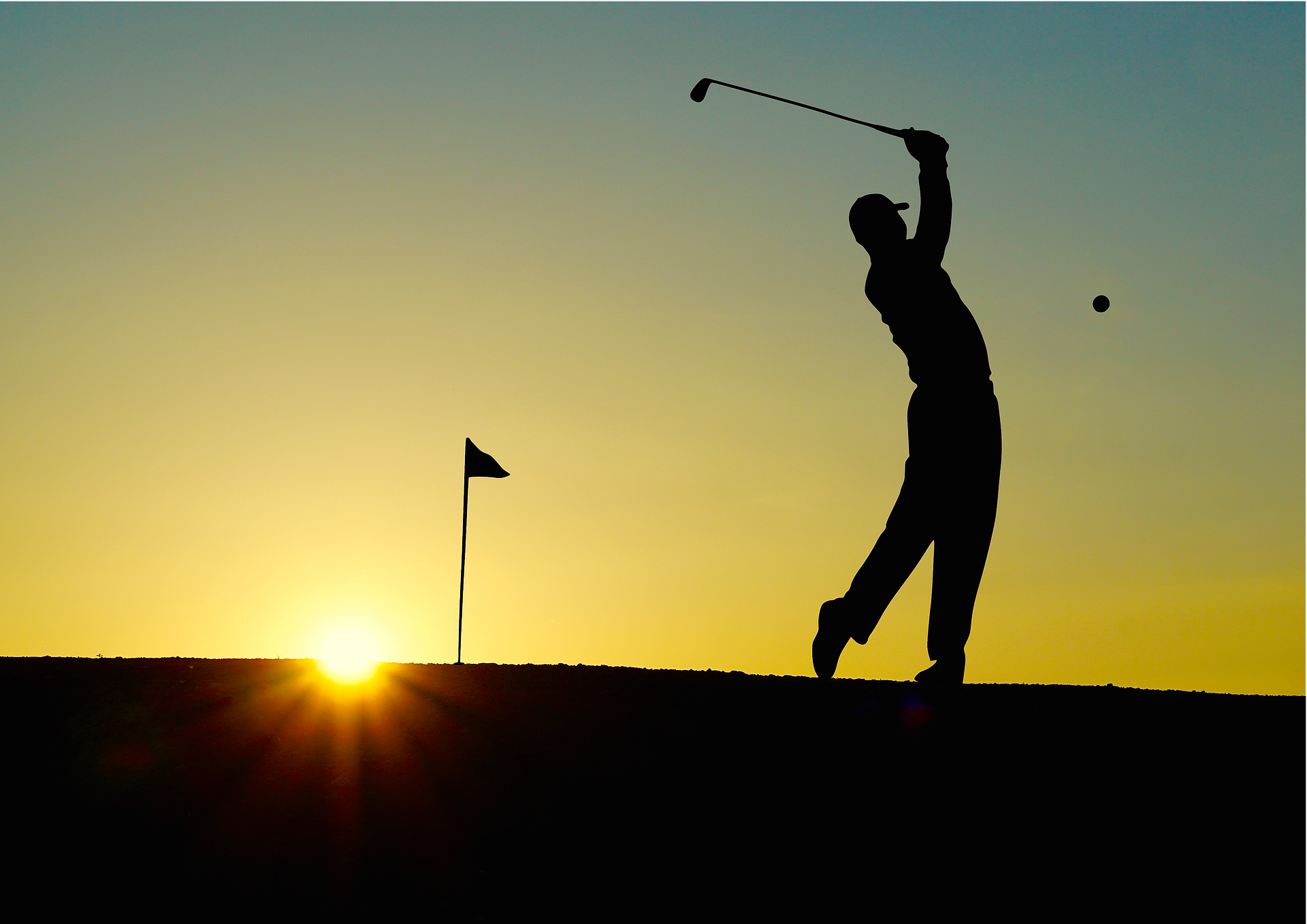 Golfing In Phoenix, Arizona - silhouette of a person playing gold