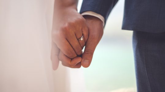 separate property vs community property - married couple holding hands